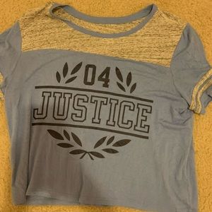 light blue girls Justice shirt.